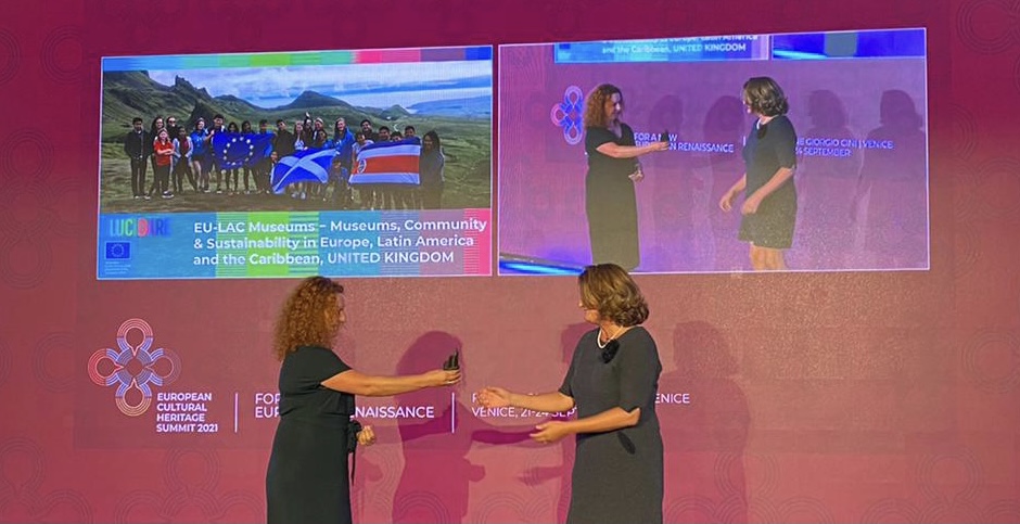 Dr Karen Brown collecting the award